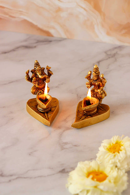 Brass Ganesh & Laxmi Sitting On Leaf Diya