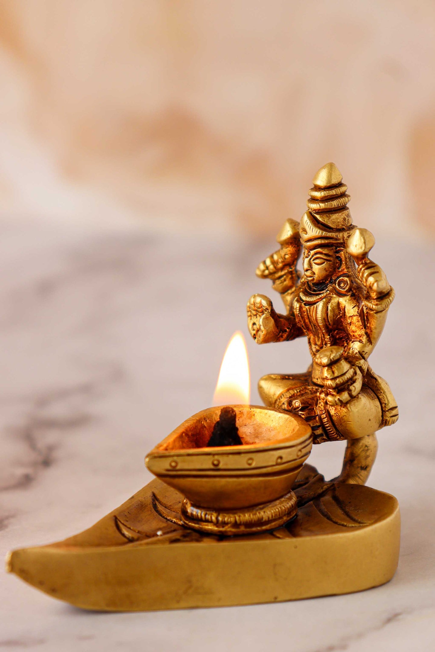 Brass Ganesh & Laxmi Sitting On Leaf Diya